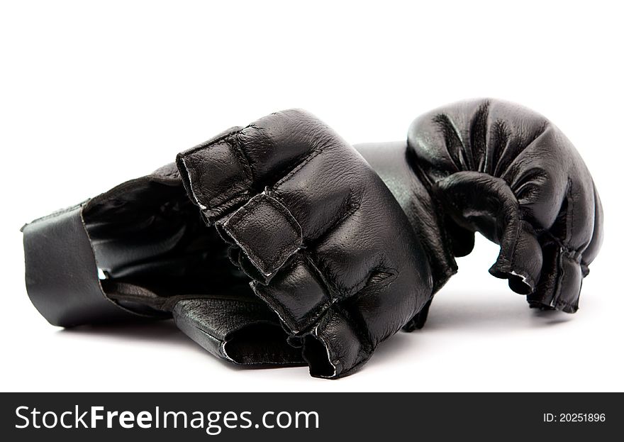 Black boxing gloves on white background