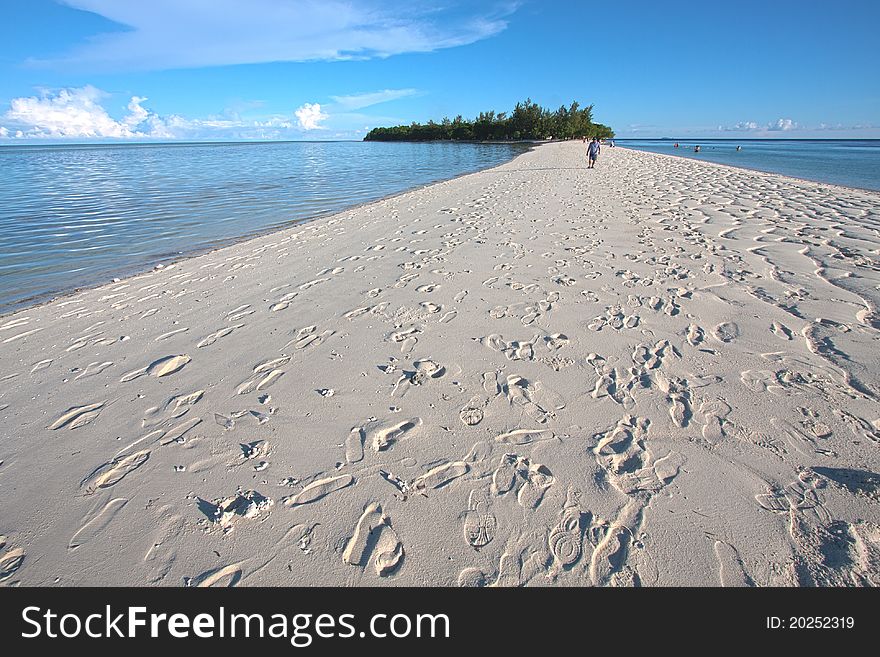 Sandy beach with footprints during low tide in Mataking. Sandy beach with footprints during low tide in Mataking