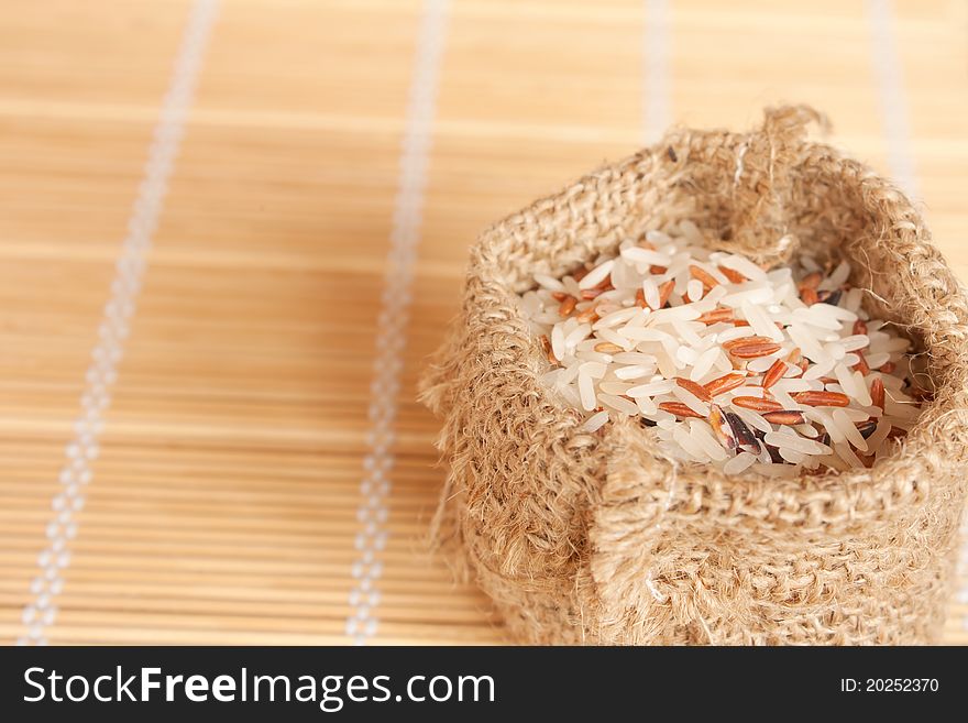 Raw rice in woven bag