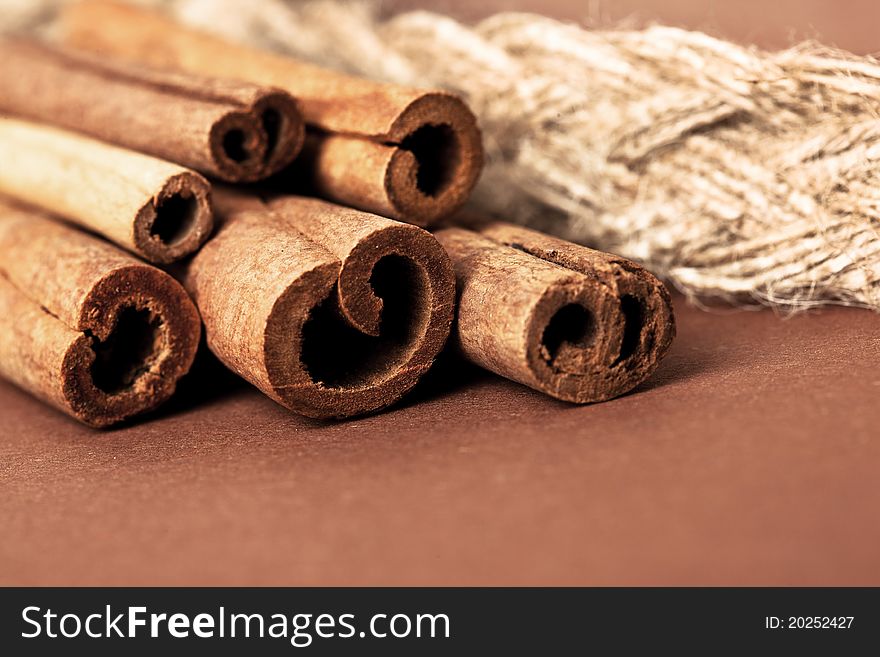 Cinnamon sticks on brown