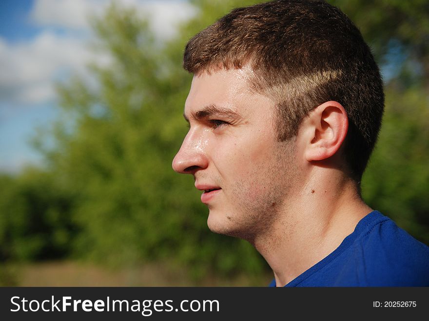 Portrait of the young smiling sportsman. Portrait of the young smiling sportsman