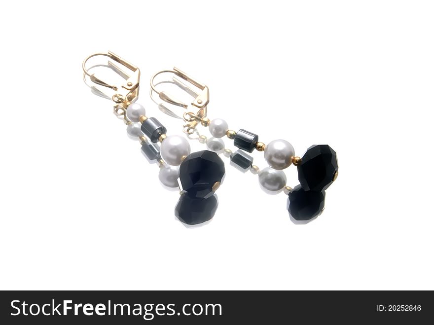Handmade earrings with gemstones, isolated over white, close up, brightly lit, nobody, two objects, group of objects