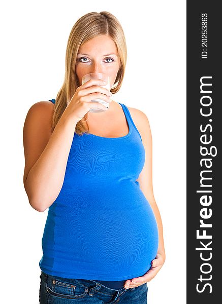 Pregnant woman with glass of milk isolated on white