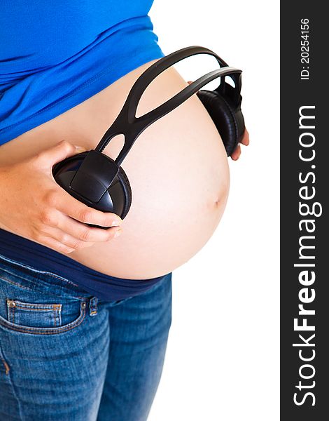 Pregnant Woman With Headphones