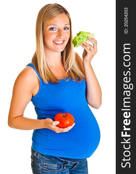 Pregnant woman with vegetables, isolated on white