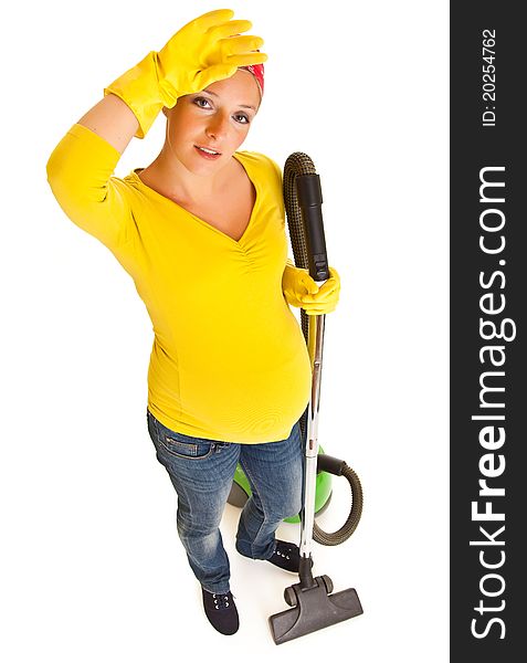 Pregnant woman clean with vacuum cleaner isolated on white