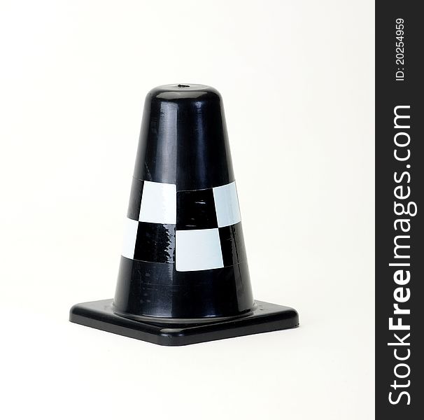 Black Traffic cone on white background