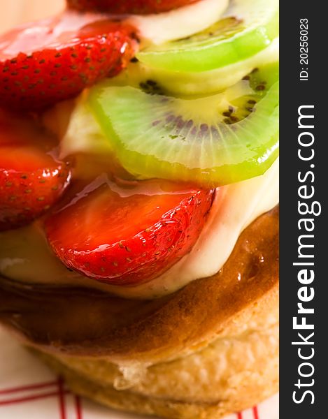 French cake with cream and fresh fruits. French cake with cream and fresh fruits