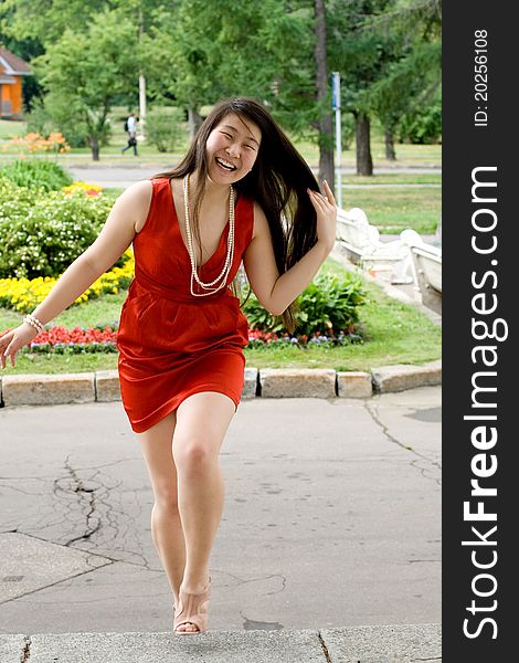 Girl walking outdoor in summer