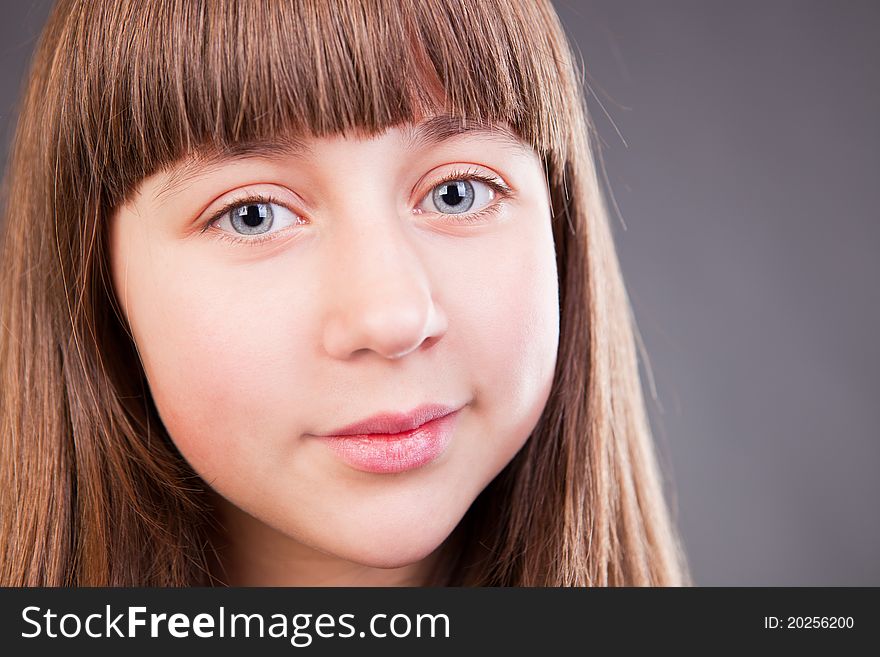 Portrait of a beautiful girl in studio. Portrait of a beautiful girl in studio.