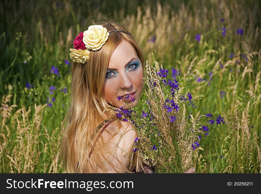 Woman With A Blue Flowers