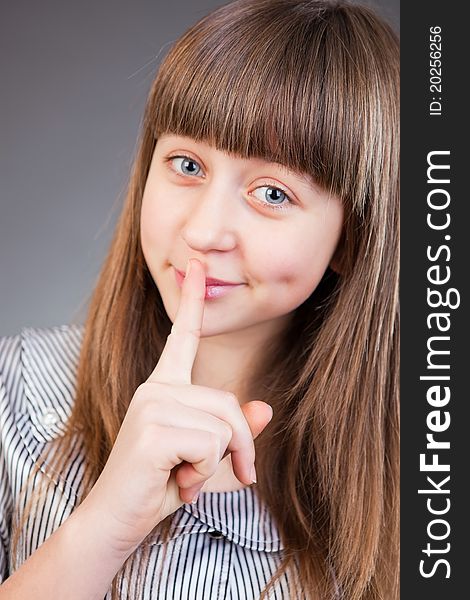 Portrait of a beautiful girl in studio. Portrait of a beautiful girl in studio.