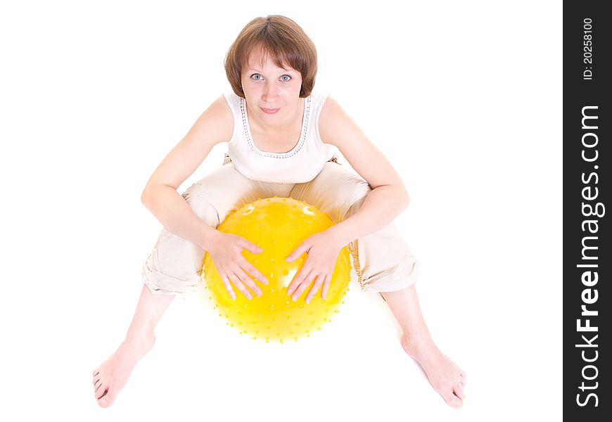 Woman with a ball on a white background.