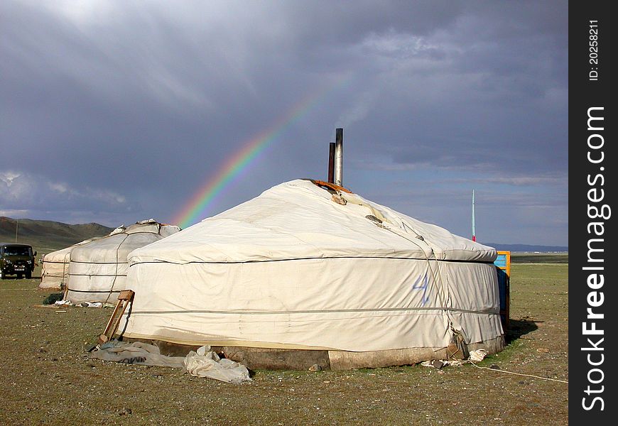 Rainbow above gers in a Mongolian steppe. Rainbow above gers in a Mongolian steppe