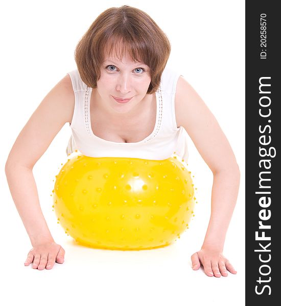 Woman with a ball on a white background.