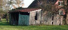 Old Shed Before A House. Royalty Free Stock Photography Old Shed Before A House. Royalty Free Stock Photography