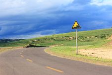Landscape Of Road With Signpost In The Grassland Stock Photo Landscape Of Road With Signpost In The Grassland Stock Photo