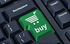 Computer Keyboard With Green Key Buy Stock Photo Computer Keyboard With Green Key Buy Stock Photo