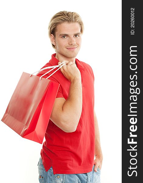 Man is holding a bag over his shoulder. Man is holding a bag over his shoulder