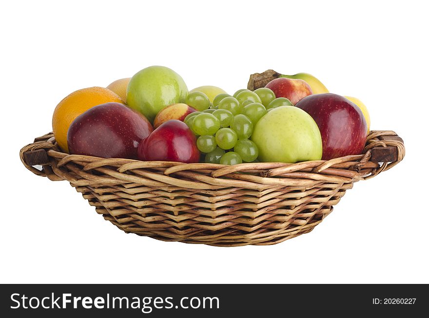 Various fruits in a wooden basket, isolated on white. Various fruits in a wooden basket, isolated on white.