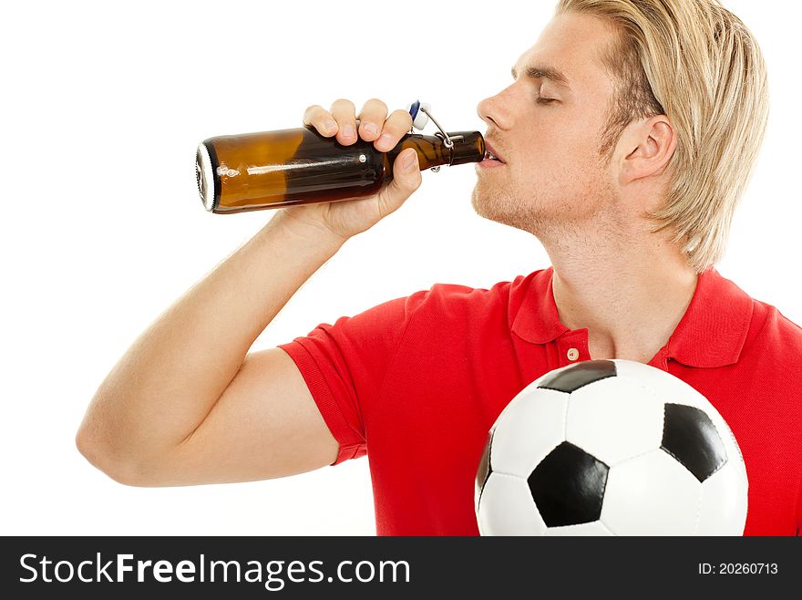 Blond man drinking a beer. Blond man drinking a beer