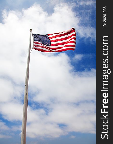 American flag against blue sky