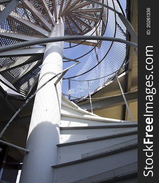 Spiral staircase with blue sky