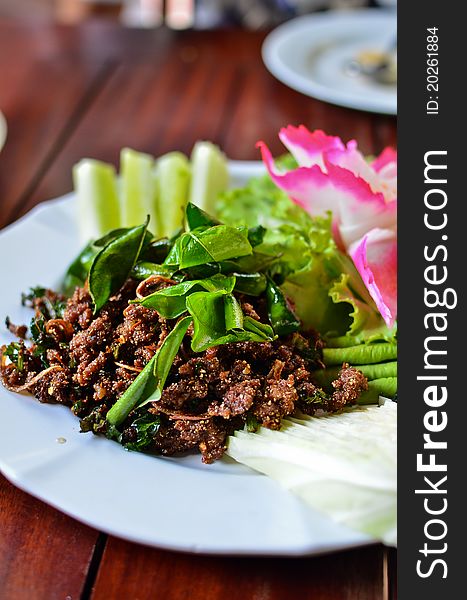 Spicy fried pork with vegetables , Thai style food
