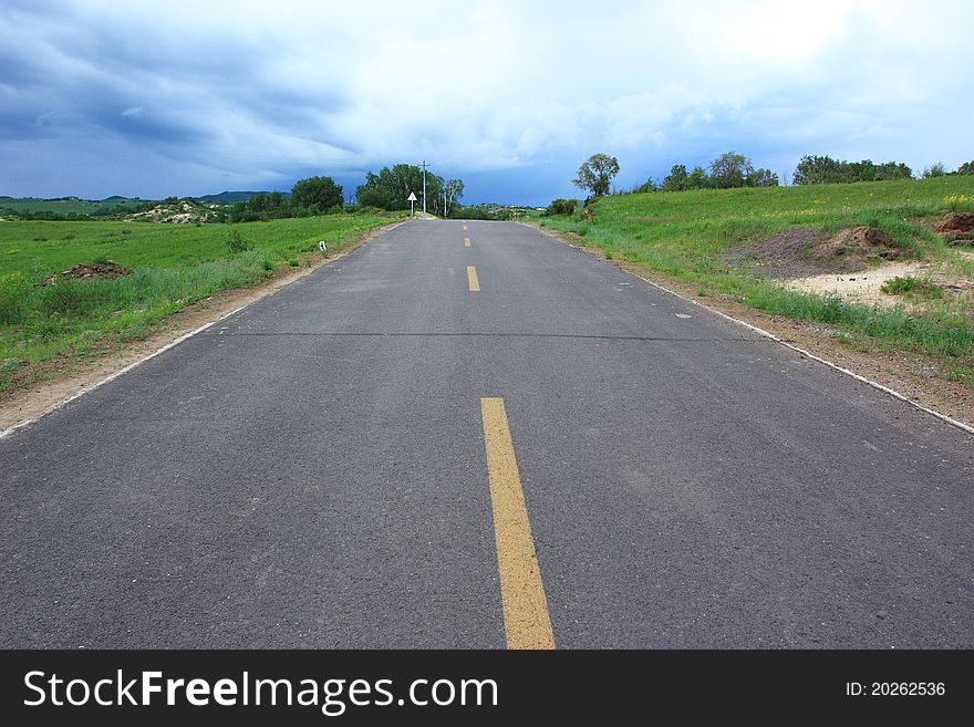 Landscape of road in the grassland at summer. Landscape of road in the grassland at summer