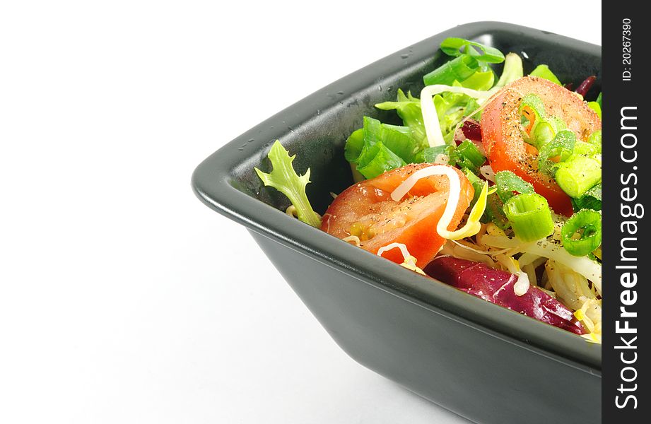 Fresh salad in bowl with copy space