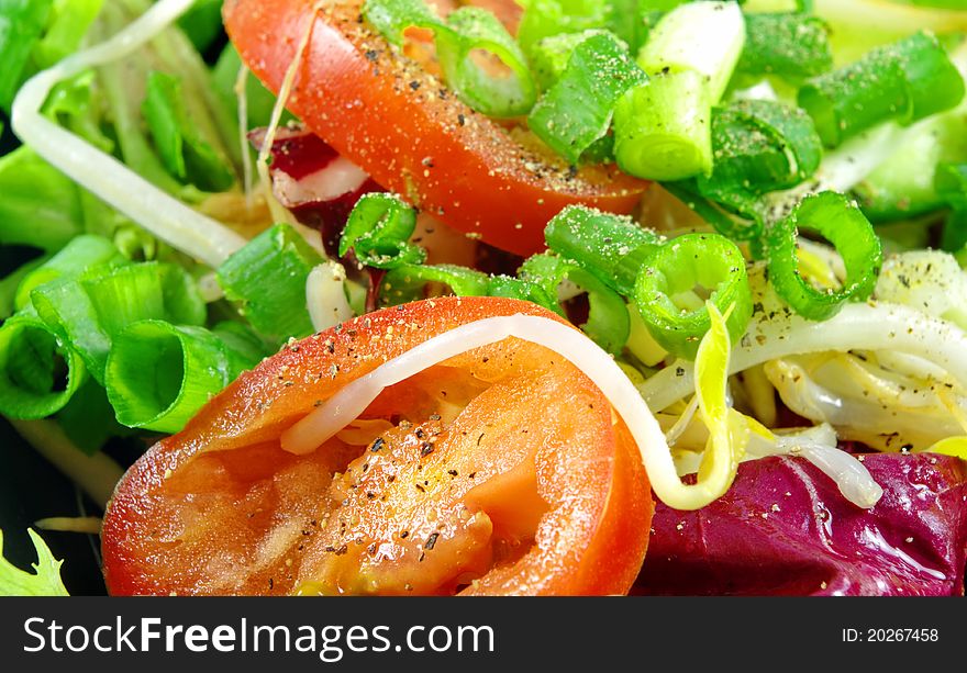 Fresh salad closeup as background