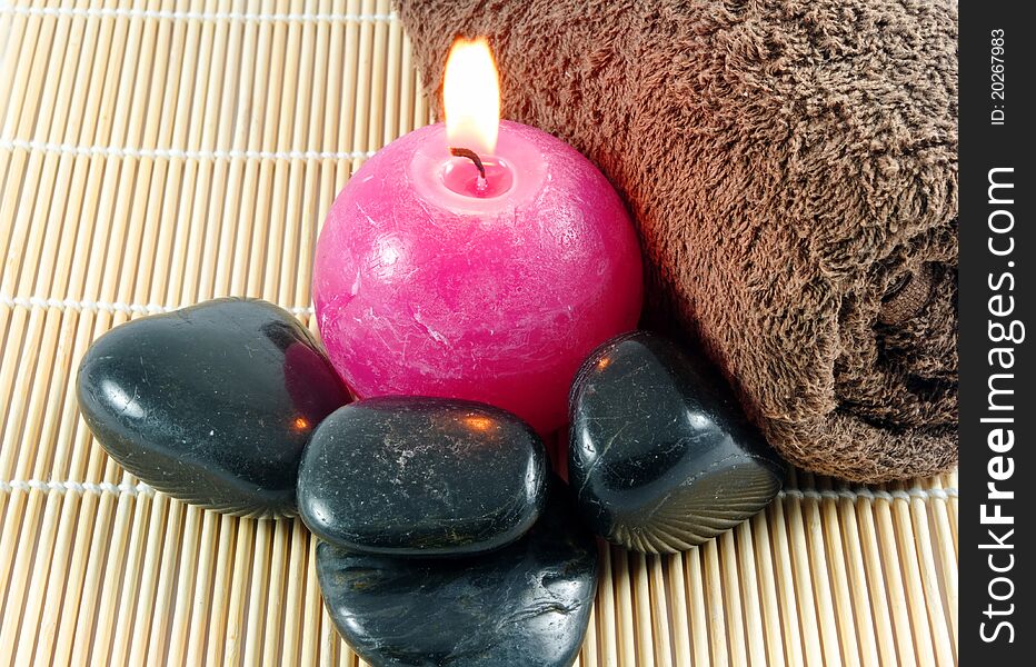 Spa stuff. candle,stones and towel