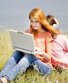 Girlfriends At Countryside With Laptop Royalty Free Stock Photos Girlfriends At Countryside With Laptop Royalty Free Stock Photos