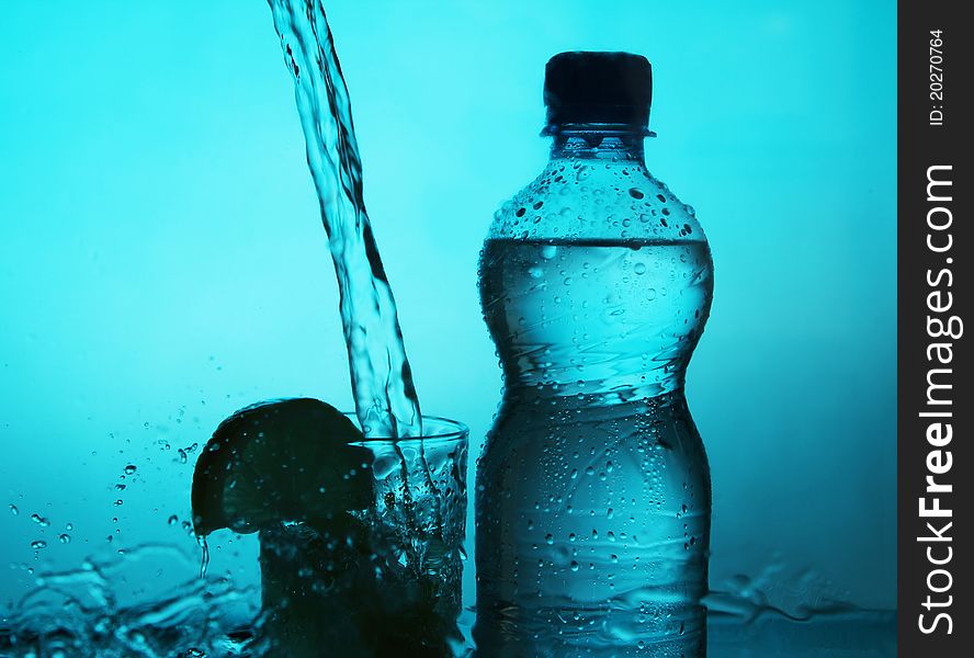 Silhouette Of Bottle And Glass