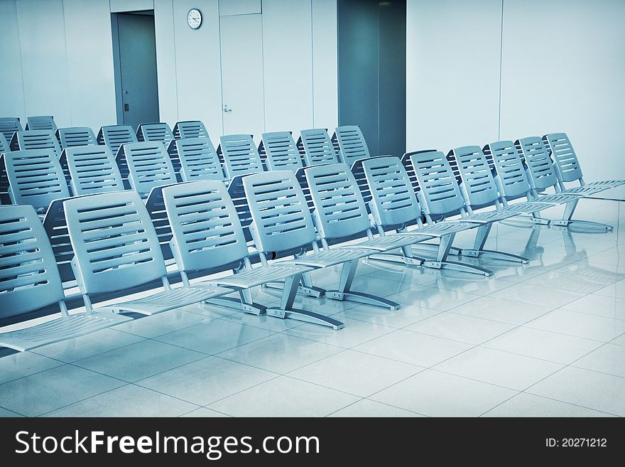 Airport waiting area with chairs. Airport waiting area with chairs