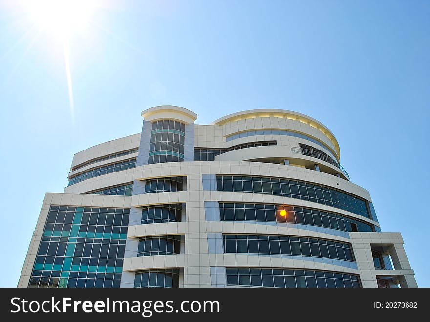 Modern building against the sunny blue skies