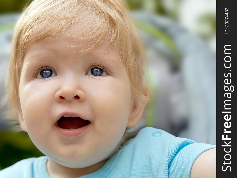 Portrait of a smiling blue eyed blond little boy. Portrait of a smiling blue eyed blond little boy