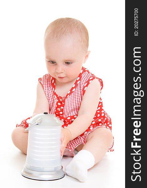 Baby in dress on a white background.