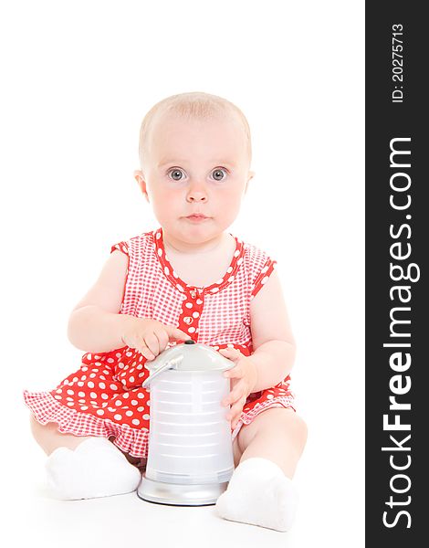 Baby in dress on a white background.