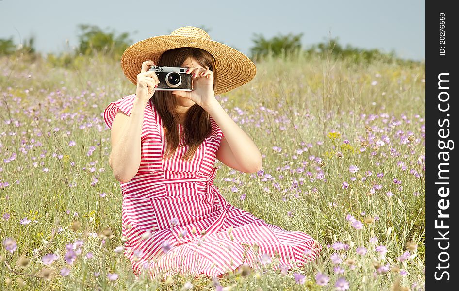 Retro Style Girl At Countryside With Camera