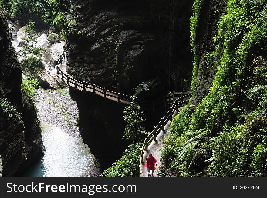 Plank road built along a cliff beside in Yunnan China