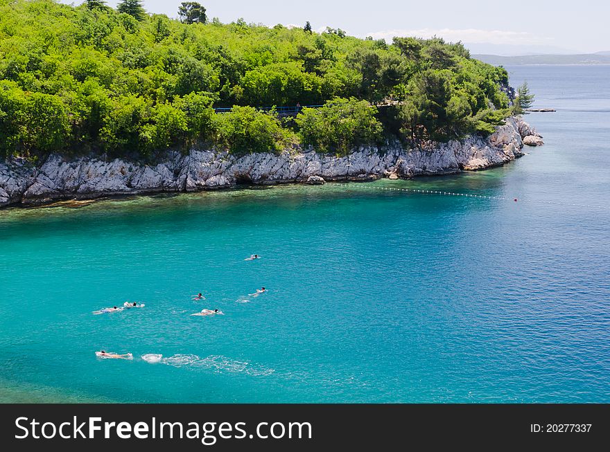 Group of teenagers swimming in adriatic sea. Group of teenagers swimming in adriatic sea