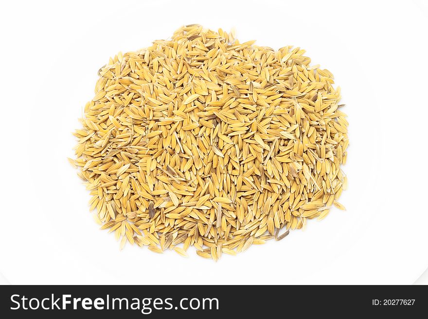 Raw rice closeup on white background