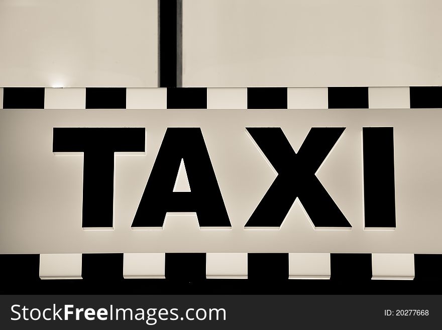 Taxi advert in airport black an white