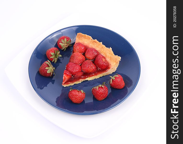 Piece of Strawberry Tart decorated with strawberries