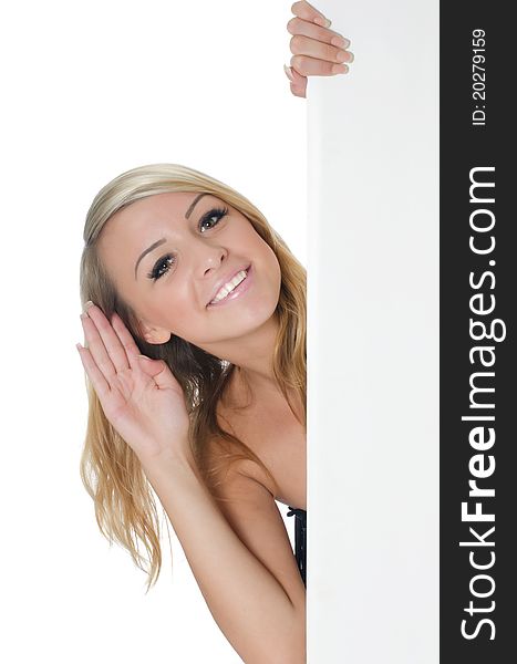 Portrait of woman holding a blank billboard on white