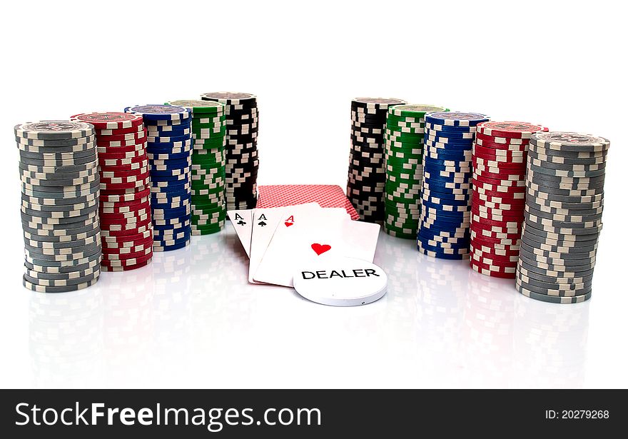 Cards and ultimate poker chips on white background