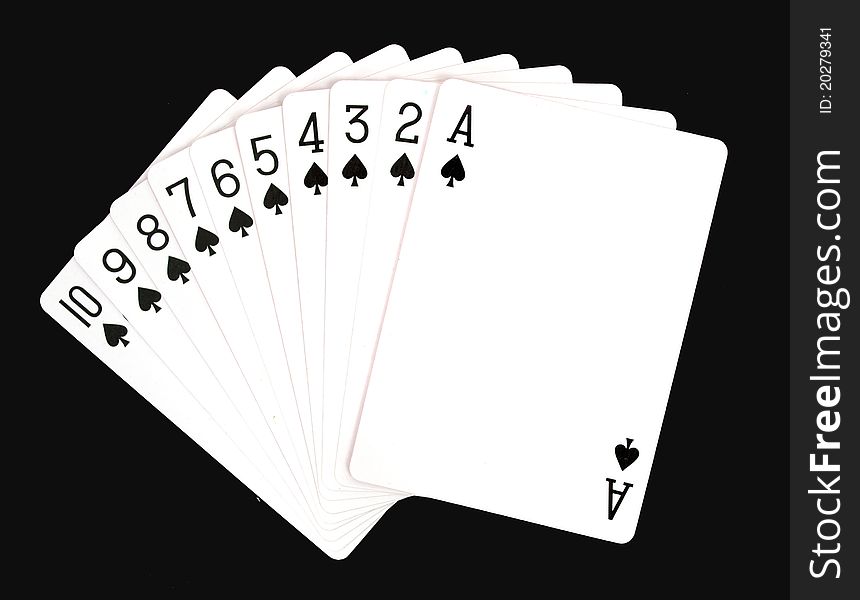 Playing cards isolated on black background