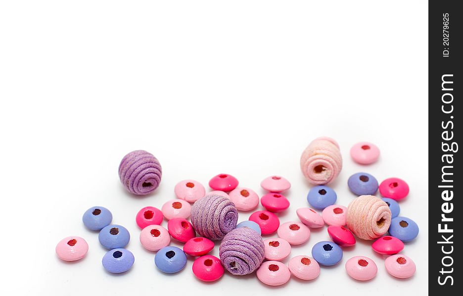 Scattering of colored wooden beads. Scattering of colored wooden beads