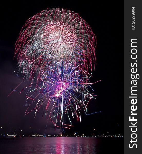 Colorful fireworks over the lake